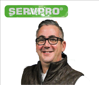 Norm Perkins- Male Employee - white wall- SERVPRO